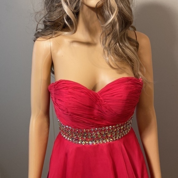 Size 0 blush prom dress worn once. Its a knee length dress has a sash with it - Picture 3 of 7